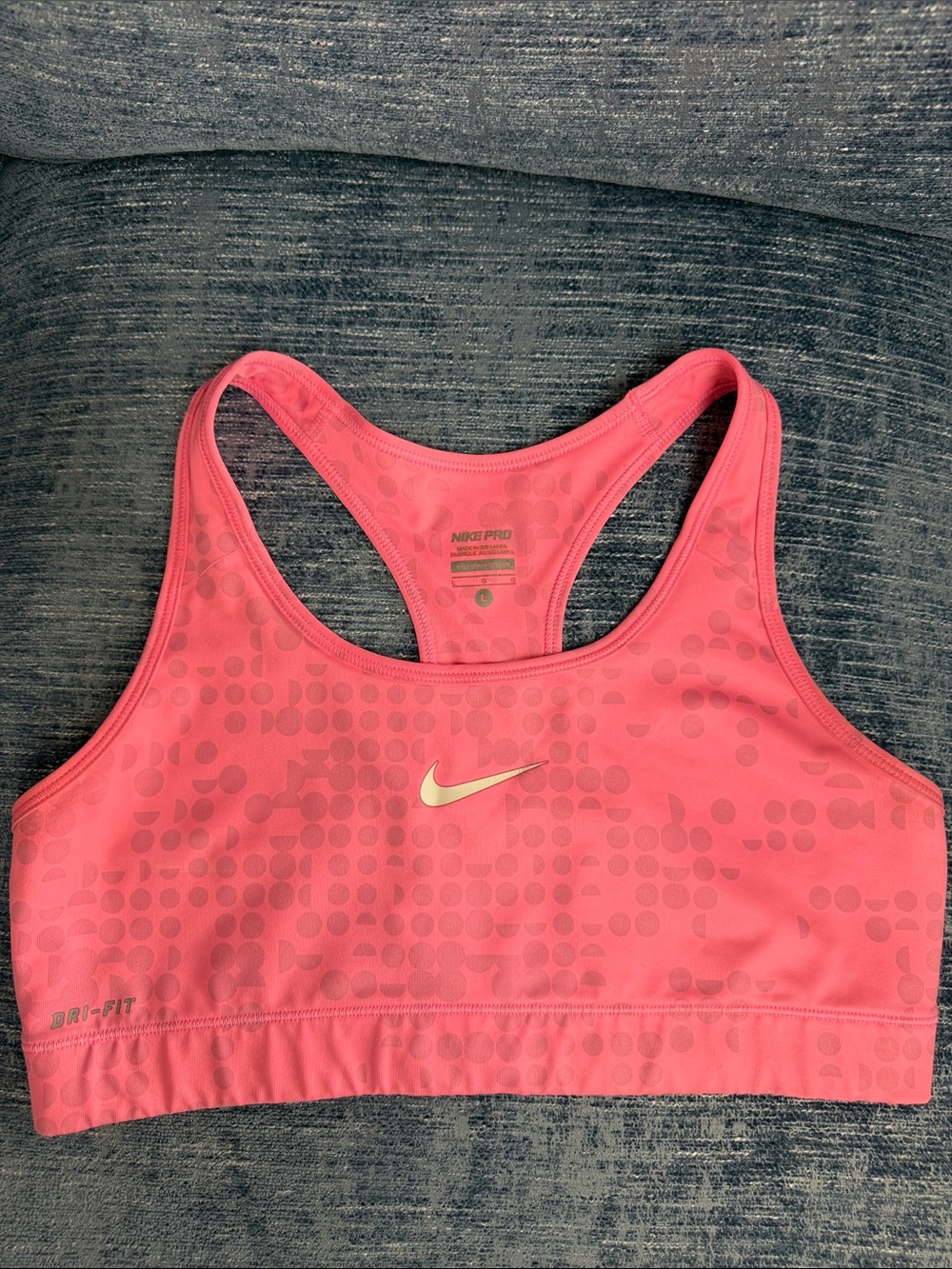 Nike Pink Racerback Sports Bra with Subtle Dot Pattern
